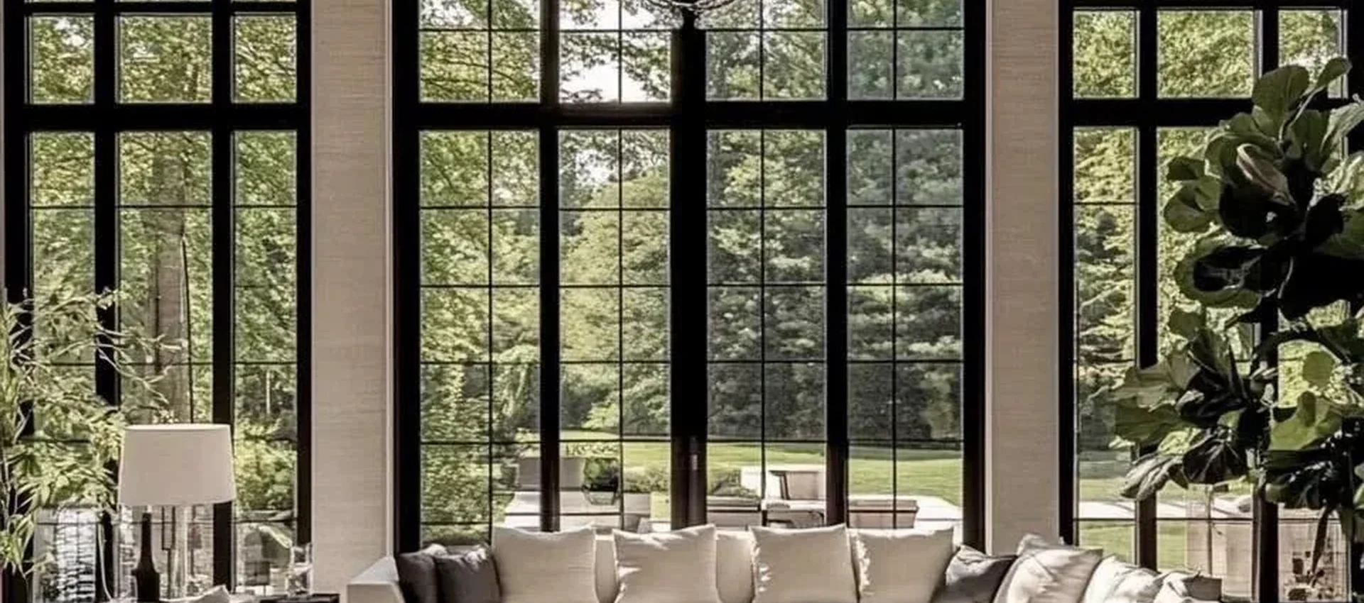 Grand residential living room with arched windows