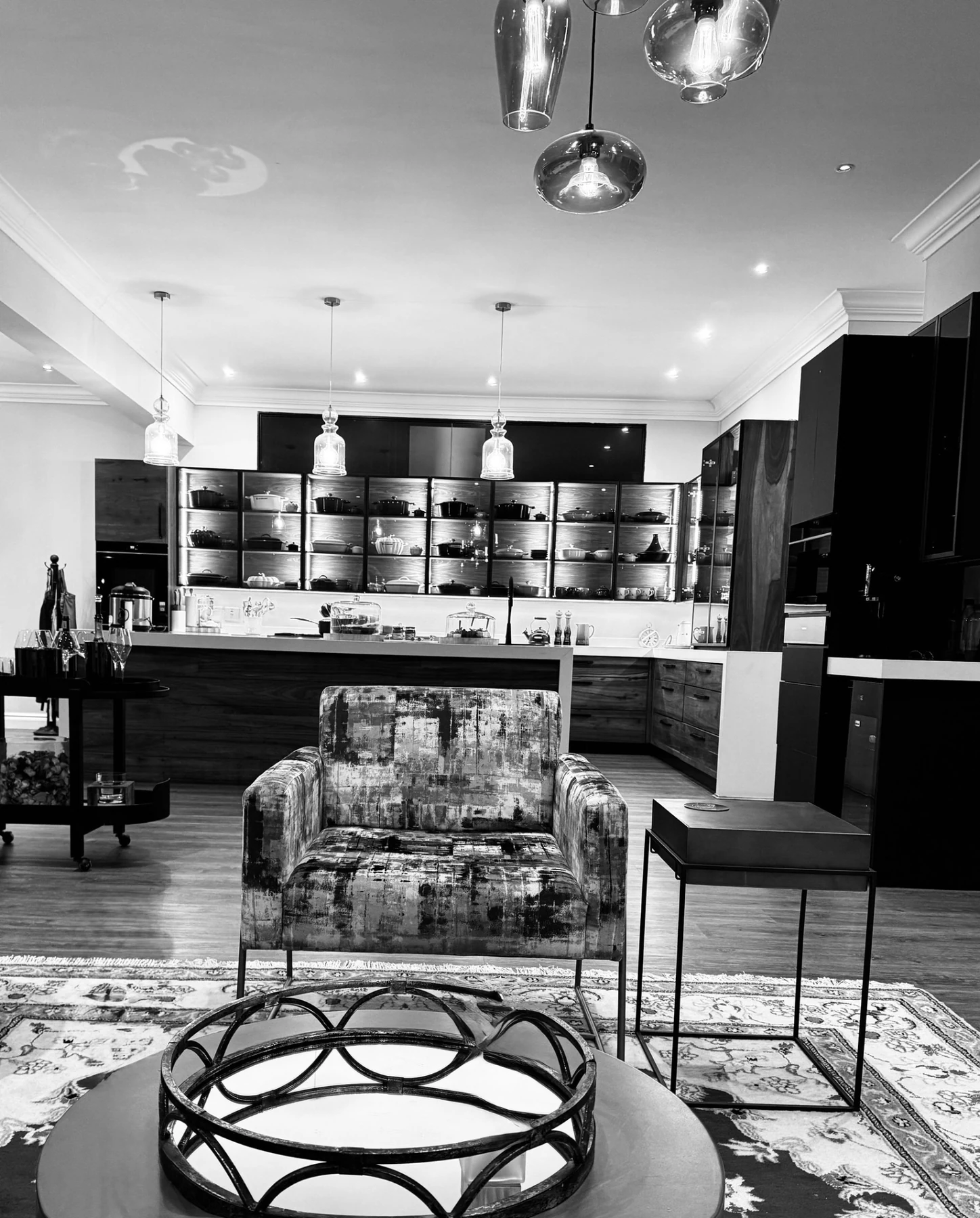 Black and white residential kitchen interior by ThiKara
